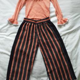 River island set 
NEW - never worn or even  tried on
3/4 wide leg trousers age 5 years
Off the shoulder Top age 5 ro 6 years