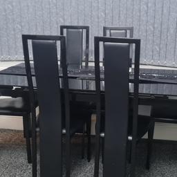 Black glass table 6 chair
Used wear and tear