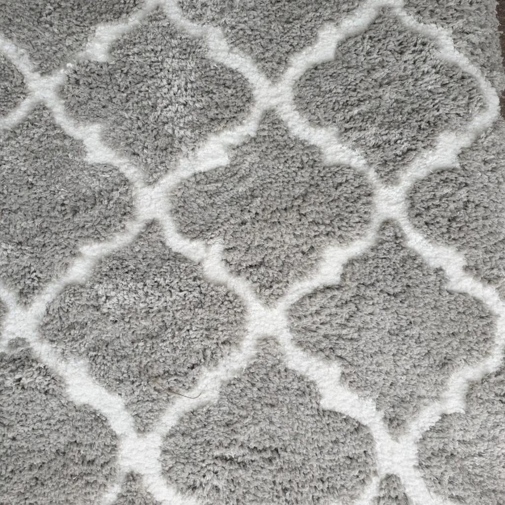 A beautiful silver ogee rug from Next. Brand new and super soft . 120cm x 170cm . Cost £125