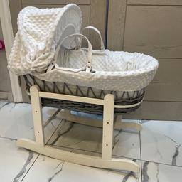 Like new Moses basket and stand 
Mattress included