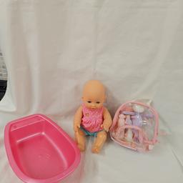 doll, bath and bottle set.
all in good clean condition.