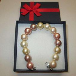Damen Armband / Perlenarmband Silber 925
Perlen bunt je. Durchmesser 1cm, Länge ca.21cm

neuwertig
Selbstabholung. Versand 4,50€
Privatverkauf