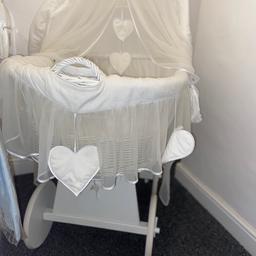 LUXURY WHITE WICKER WHEELS MOSES BASKET. Stylish trolley with a wicker basket works great as a baby cradle. Wicker basket. 2 comfy fitted sheets .