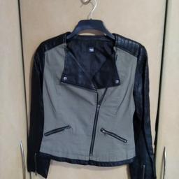 never been worn BIKER TYPE JACKET SEE SECOND PICTURE PICK UP ONLY