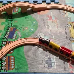 wooden train tracks and wooden trains with magnets like new hardly been played 

cash on collection only from en3