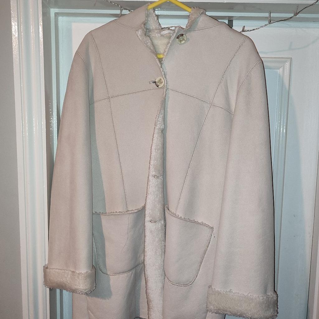 faux sheepskin coat in very good condition from BHS size 16 looks good on various sizes depending on the fit required, it hangs nicely so looks good on someone who is 12-14 also