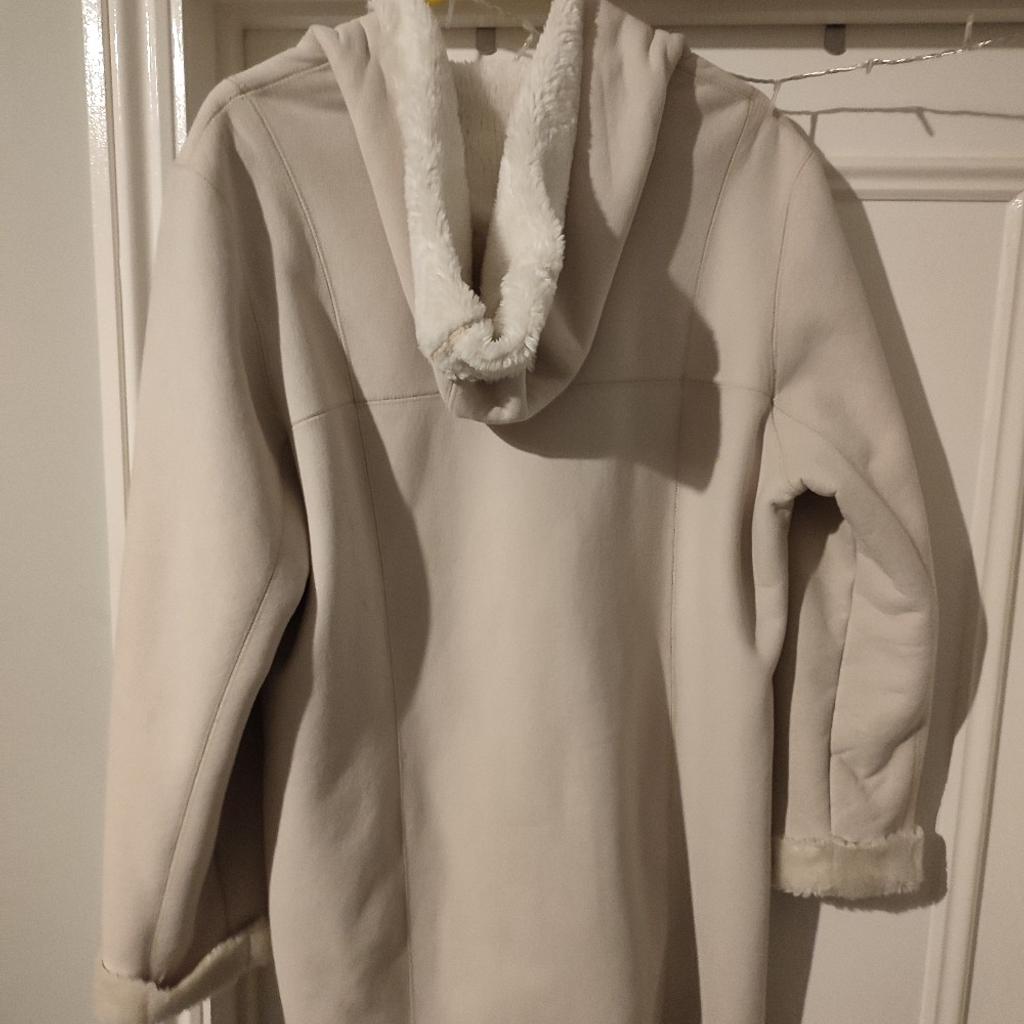 faux sheepskin coat in very good condition from BHS size 16 looks good on various sizes depending on the fit required, it hangs nicely so looks good on someone who is 12-14 also