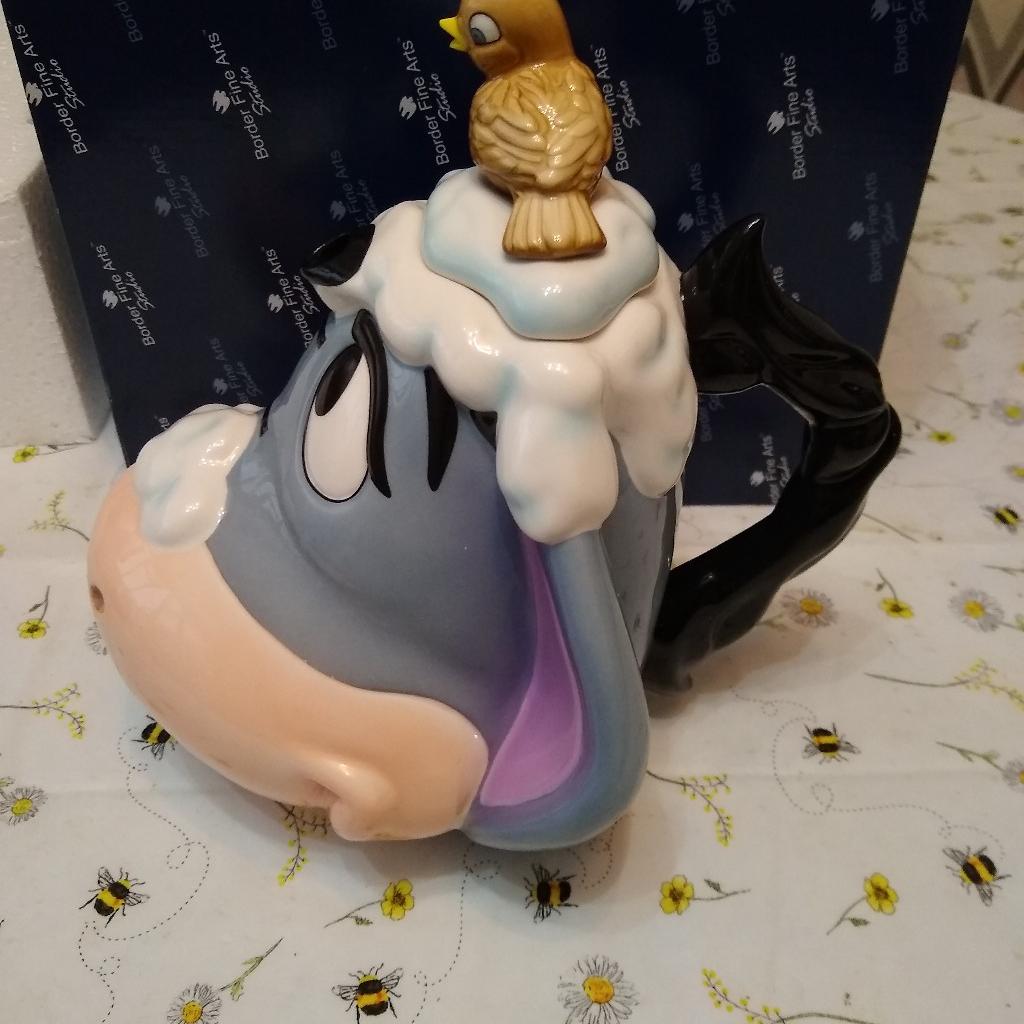 boxed new large Eeyore in winter teapot border fine arts.
excellent addition to collection