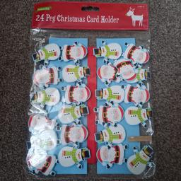 Brand New 24 peg Christmas card holder, brand new, in excellent condition, from a pet and smoke free home.