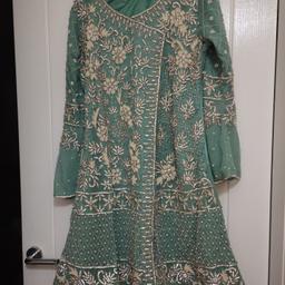 nice wedding suit with lehnga , really nice and heavy ..light sea green color and heavy stone work