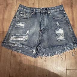 Brand new womens denim shorts from shein. Got two by mistake. Perfect for when summer time comes. Size medium. 