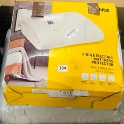 New, never used Zanussi, single electric mattress protector.
