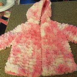 pink fluffy coat size three to six months