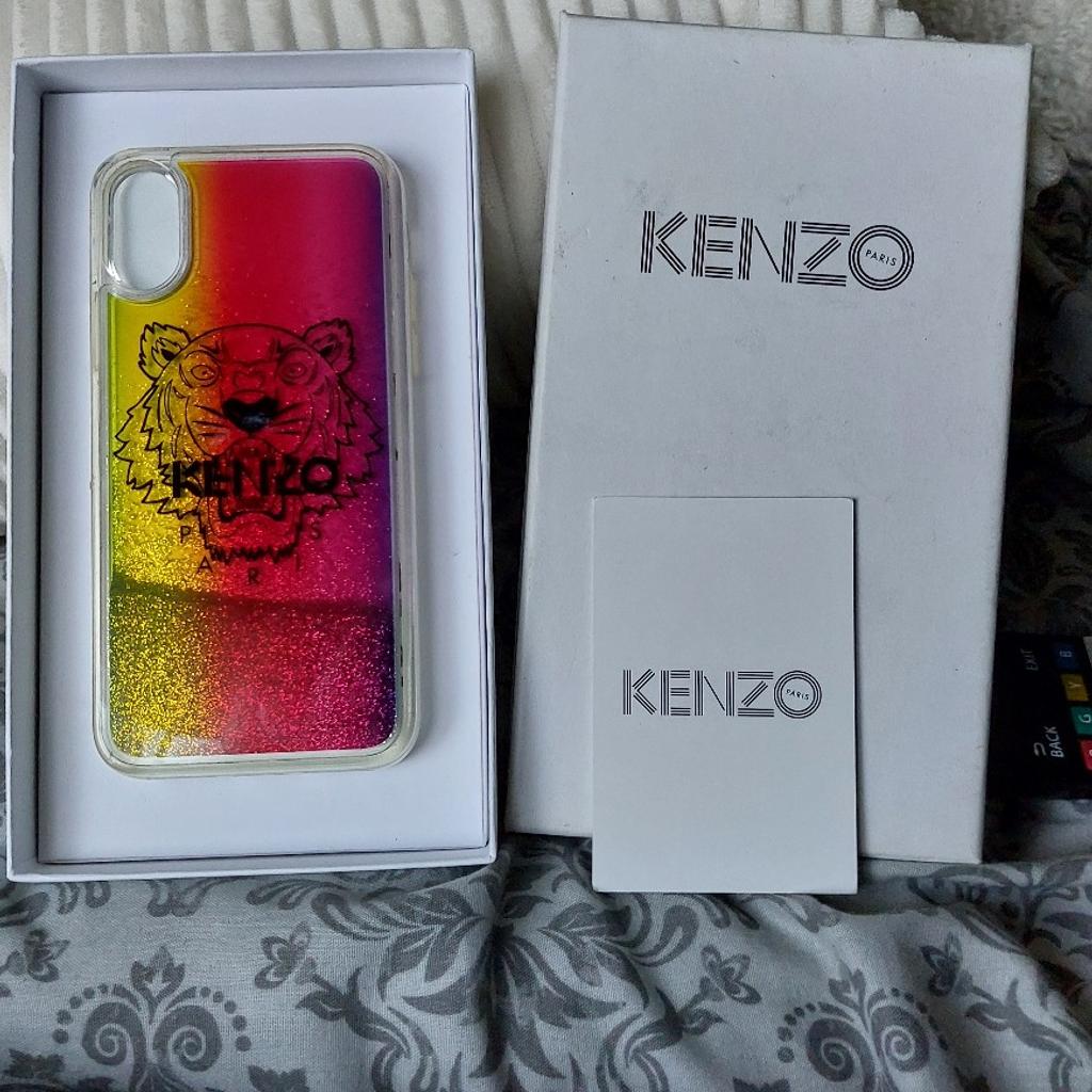brought this last year for my granddaughter, but as she wanted to set phone up (lol thinking she knew how ) ended up blocking the phone so that was end of a brand new phone which il put on here so we never got as far as using the case .it is a genuine kenzo case,as you move the case around tge gel or what is in the case moves so the glitter moves around the large logo on the case .it is red and gold colour but hard to take picture as it shows different colours in the light in original box