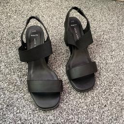 Black sandals from New Look with elasticated back and block heels. Size 4. Worn twice and would be very comfortable but too wide for me. Originally £25.99.