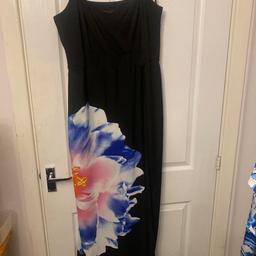 Beautiful evening jumpsuit with skirt overlay.
It’s a size 18 but if you’re bigger than a D cup I’d say it was a large 16