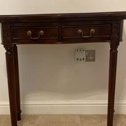 Housing units wooden console table has a mark on top shown on picture and some wear and tear but In good condition