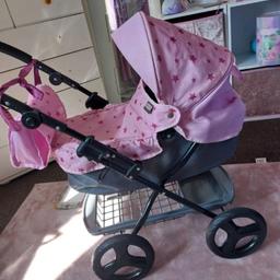 mamasandpapas dolls pram
like new played with once outdoors 
indoor used only 
pink with stars
comes with change bag
excellent condition