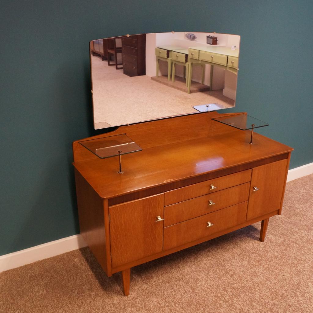 Mid Century Sowerby Bridge

Harris Lebus Dressing Table Original Handles & Mirror

Measurements H124cm x L116cm x D42cm

Collection from Mid Century Town Hall Street Sowerby Bridge, We are happy to liaise with couriers and would recommend Anyvan Or Shiply for quotations.

Please message me to arrange viewings
and check out my other items available

Items may show signs of wear and imperfections due to age