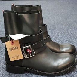 Tommy Hilfiger Ladies Black Leather Buckle Biker Calf Boots.
UK Size 6.5
New with tags but without Box
RRP £210


Natural grain leather upper are a guarantee for timeless elegance as well as comfort.
The sole of these fall-winter shoes is made of high-quality material, characterized by durability and resistance to bad weather.
The shoes are made with a high-quality leather interior, which also happens to be very soft. 
Leather insole which does not wear off or wrinkle. It’s skin-friendly and will give your feet complete freedom
Flat bottom sole will give you stability and make walking on icy surfaces easier.