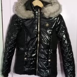 River Island Girls aged 11-12yrs High Black Shine Puffer Jacket Coat Faux Fur Hood. RRP£60+ Dispatched with signed for service Royal Mail if chosen.

Great for winter as well as school, daily wear.

Been in storage, so best advised to wash before use.

Collection preferred or can be posted out at extra costs globally.  Always try to minimise costs & recycle materials, as well as combine postage if interested with other items.  

Local delivery available at extra costs to cover fuel & time.