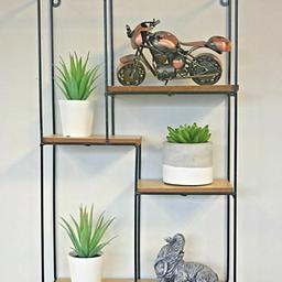 5 Section Wooden Effect Floating Shelf with iron cage frame that is perfect for the modern household. A great decorative accessory to bring a little fashion to your home. Lightweight and strong, this Wall Mountable Shelf displays all of your favourite ornaments, pot plants, trinkets and small picture frames in a beautiful way. The wooden effect is highly complimented by the solid iron cage frame which provides strong and long lasting support.

Comes with screws and 2 built in loops to attach to your wall.

Materials:
Made from manufactured board with wooden effect.
Iron cage wire for support and strength.
2 screws provided.

Dimensions -  50.5cm x 30cm x 12cm approx