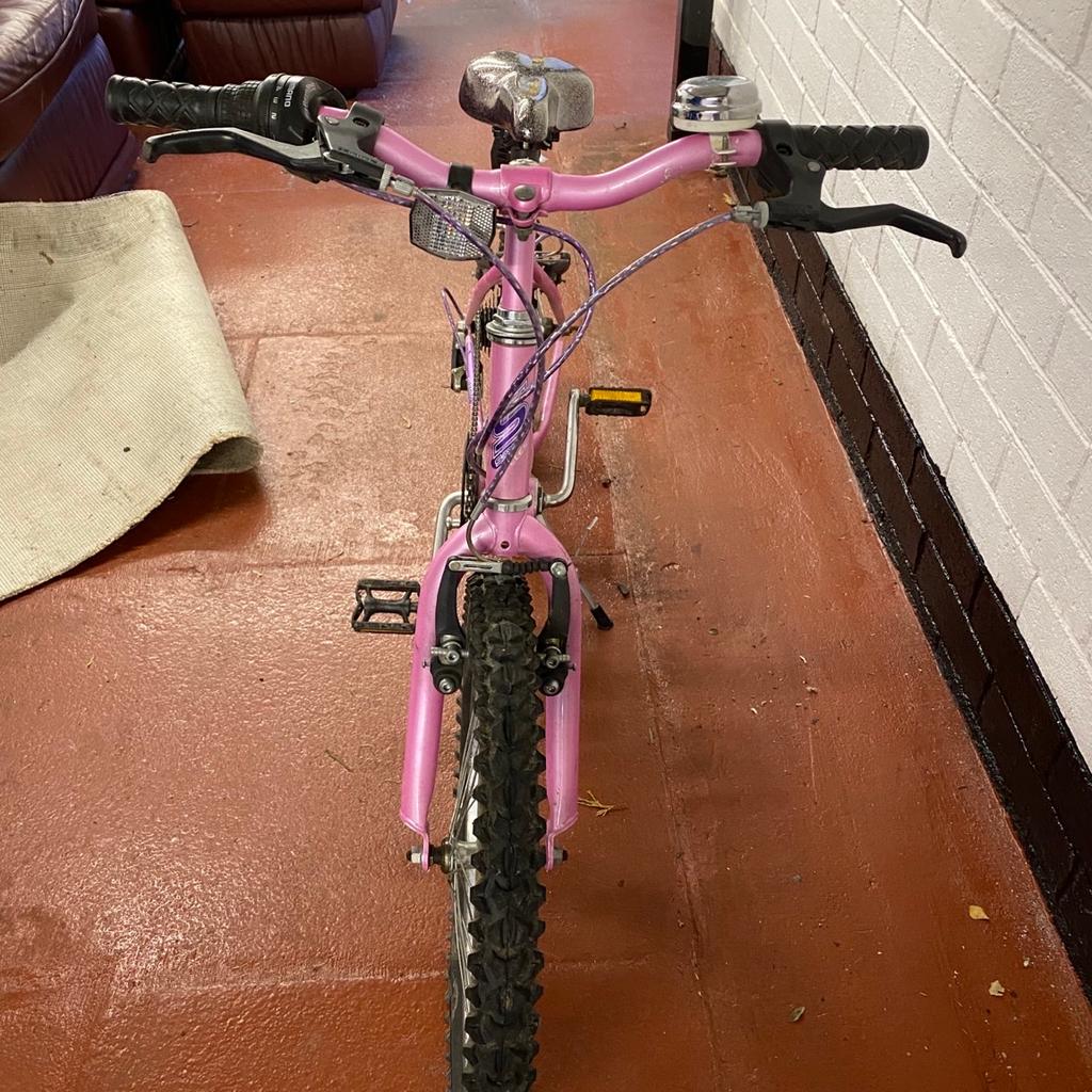 Girls pink bike Saxon Kalutara good condition Height 26” Length 53” Adjustable seat and handlebars.