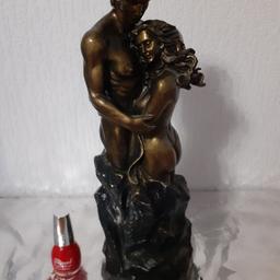 Lovely, romantic couple in an embrace. Bronze effect. Lightweight. Nail varnish illustrates size. About 12 inches tall. Good condition. Will make ideal Christmas present. £10.00. Collection from L11. Thankyou .