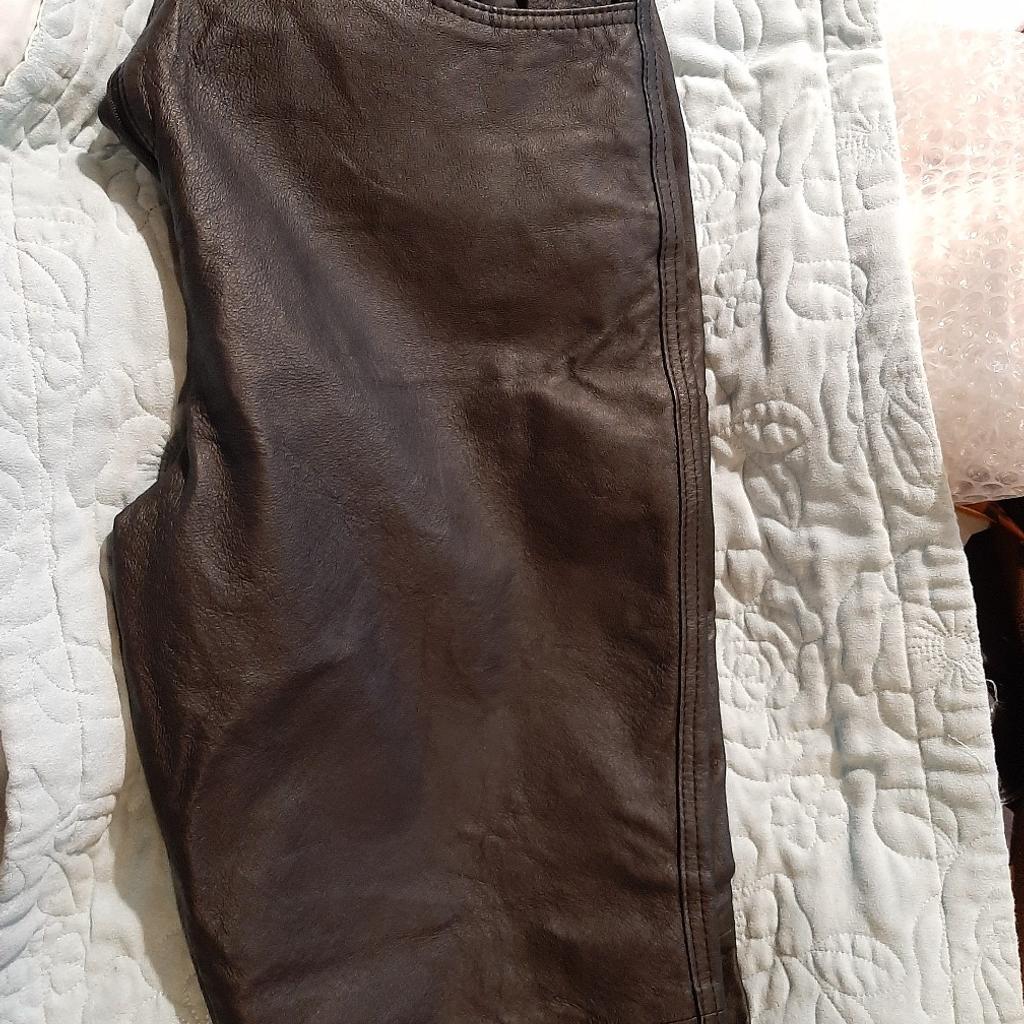 leather look or real leather trousers I can't tell but look leather size 14 good condition apart from a tiny seam of lining needs a needle an thread 2 min job see pics