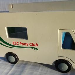 ELC Pony Club Horse Box.

Rare find.  Horse box is made from wood with a detachable roof.  Cabin doors open as well as a sliding rear door ramp.

Pony, tack box & accessories all included, as other items can be bought online.  Please slight damage to the rear left ramp, so needs sanding down or repaired.  Reflected in the price.

Local delivery available at extra costs to cover fuel & time, but you will be requested to pay a deposit via PayPal due to time wasters.  

Learnt the hard way.