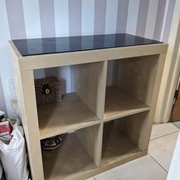 a unit for sale. with black glass top. and 4 large shelves. no longer needed