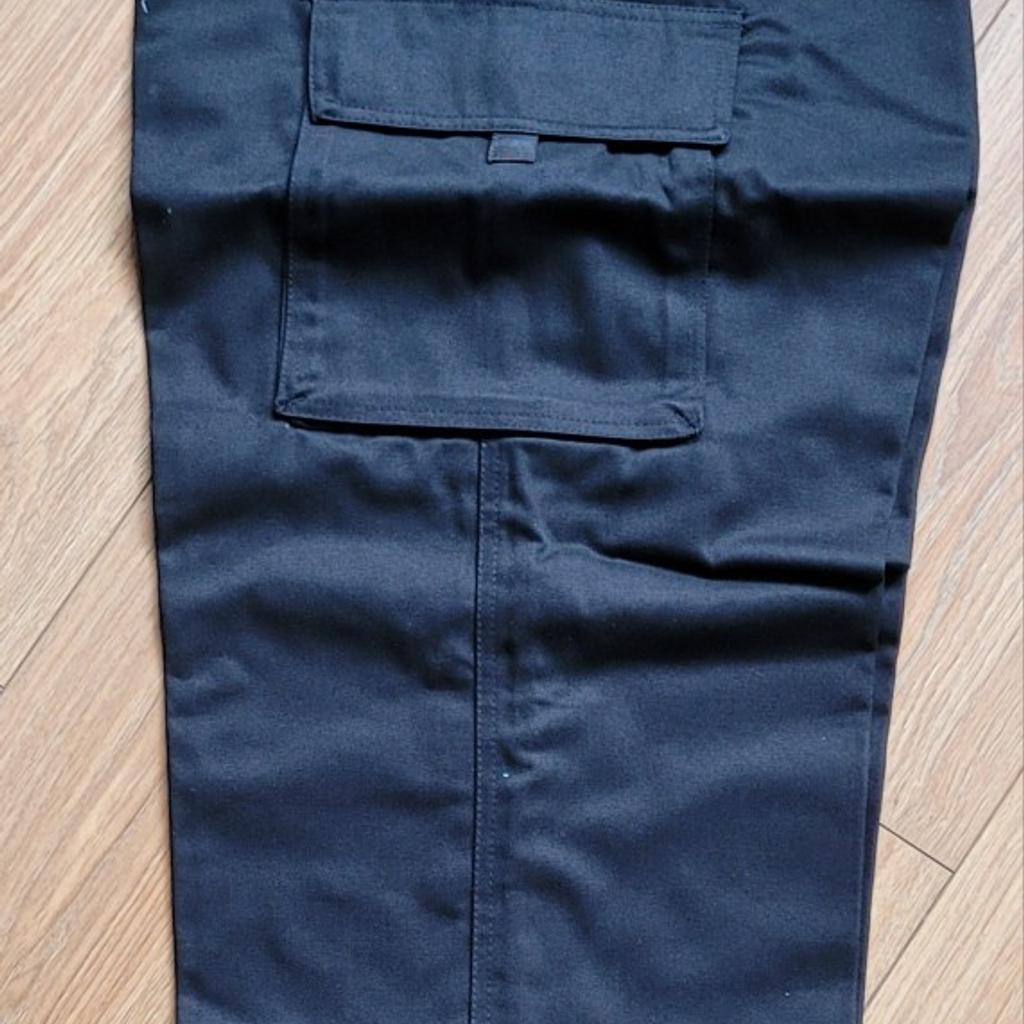 Upgrade your workwear wardrobe with these black cargo trousers from RTY Workwear. Made of a durable blend of polyester and cotton, these trousers are perfect for both casual and work occasions. The trousers feature a straight leg style, zip and button closure, and cargo pockets for added convenience.

With a waist size of 40-42 inches and a size type of regular, these trousers are perfect for men who need both comfort and style. They are also machine washable for easy care and maintenance. Add these versatile trousers to your autumn, winter, summer, or spring wardrobe and enjoy the benefits of a functional and fashionable piece of clothing.