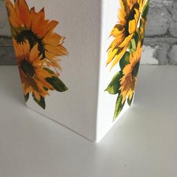 Brand new, Handmade item 
Large square glass vase 
Hand painted &  decoupaged with giant sunflowers 
Fill with your favourite fresh or artificial flowers, or a lovely decorative item on its own. 
Flowers not included 
Listed on multiple sites 
From a smoke free pet free home