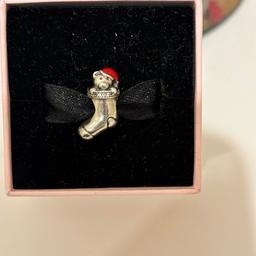 Pandoras Teddy Stocking  Charm New
Red/silver with diamantés 
Comes with a flat Christmas box, that looks great on a tree. 
Collection or possible local Delivery only. Sorry no posting 
Brownhills/area WS8
