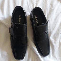 Boys Black shoes worn twice to a wedding in good condition
£8 ONO