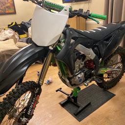 Hello thanks for looking at my ad I got a kxf450 lovely looking bike need graffiti's and a little TLC starts first kick go in all the gears smooth come get yourself a bargain any inspections welcome cash in hand for test ride serious buyers only no messing about stand come with it got a few other bits and bobs
