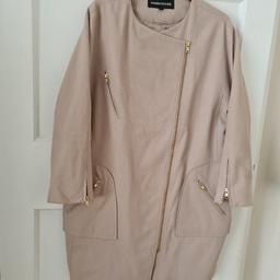 Warehouse Ladies Coat in beige. Size 16. Zip full-length zip front fastening, also on pockets & sleeves. In very good condition.