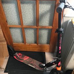 Teenage scooter very good condition has a brake on the side and on the back,comes with the box and has a spanner.