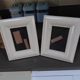 2 x Next cream photo frames . Size 9.5 ins x 7.5 ins . Lovely condition from a smoke-free home.