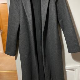 Worn twice Zara medium size grey coat in good condition, comes from a smoke and pet free home pick up only