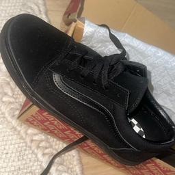 Brand new Black Vans, never worn has been left in box and packaging