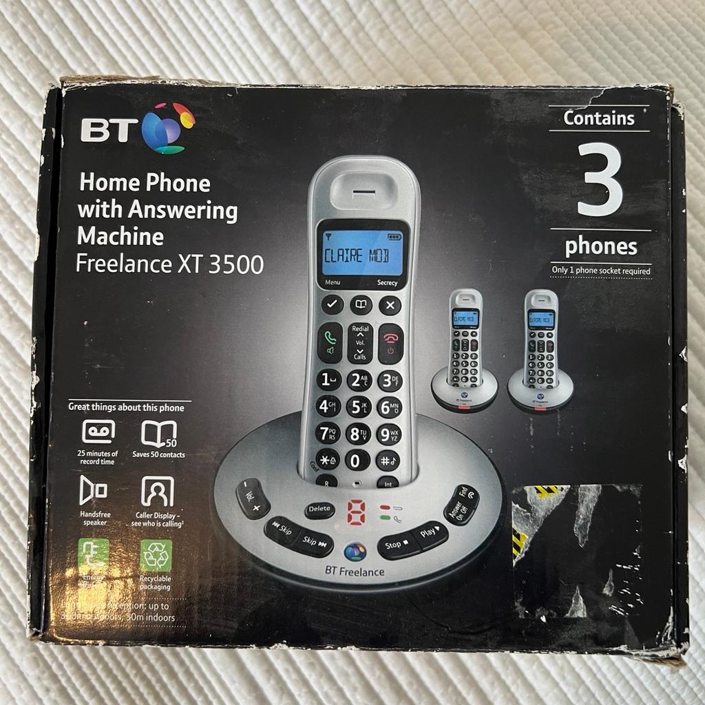 BT home phone with answering machine. Boxed, has three phone units. Good working order.