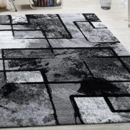 black and grey rug.
240cm x 340cm