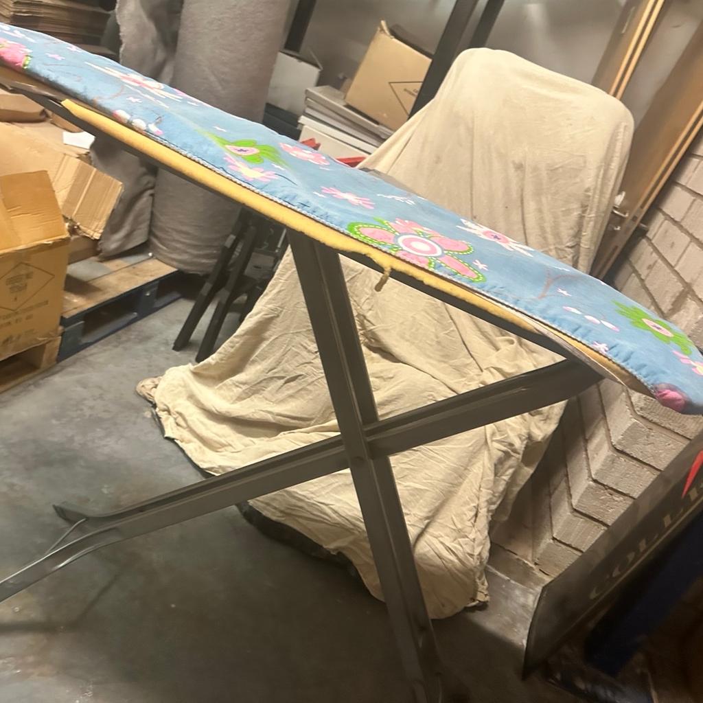 Folding ironing board, lightweight with safety and iron rest

Adjustable heights with a hanger storage rest compartment

Just needs a brand new cover and the iron rest is slightly slanted but still can use.

Selling cheap- collection only