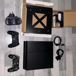 PlayStation 4 with 2 controllers, wall brackets for ps 4 and controllers , dabble charger , power cable and HDMI cable- perfect work condition would make perfect Christmas gift
