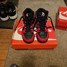size 12 kids black and red nike high tops been worn but still good condition