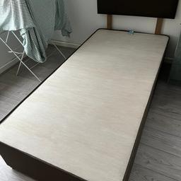 Single bed brown material with two storage draws and headboard