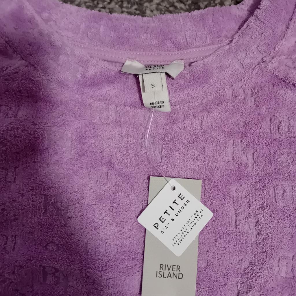 New with tags
Size Small / Petite Top
Towelling Material
Seems to be a mark on the back
 (should wash out) - has been kept in the bag