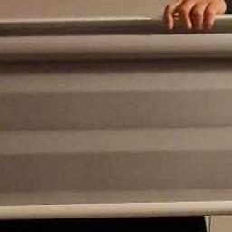 Grey never used roller blind. 85" width, never used so length(drop) unknown but believed to be 6ft. Can deliver.