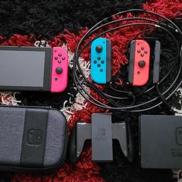 nintendo switch with 3 games, case and accessories